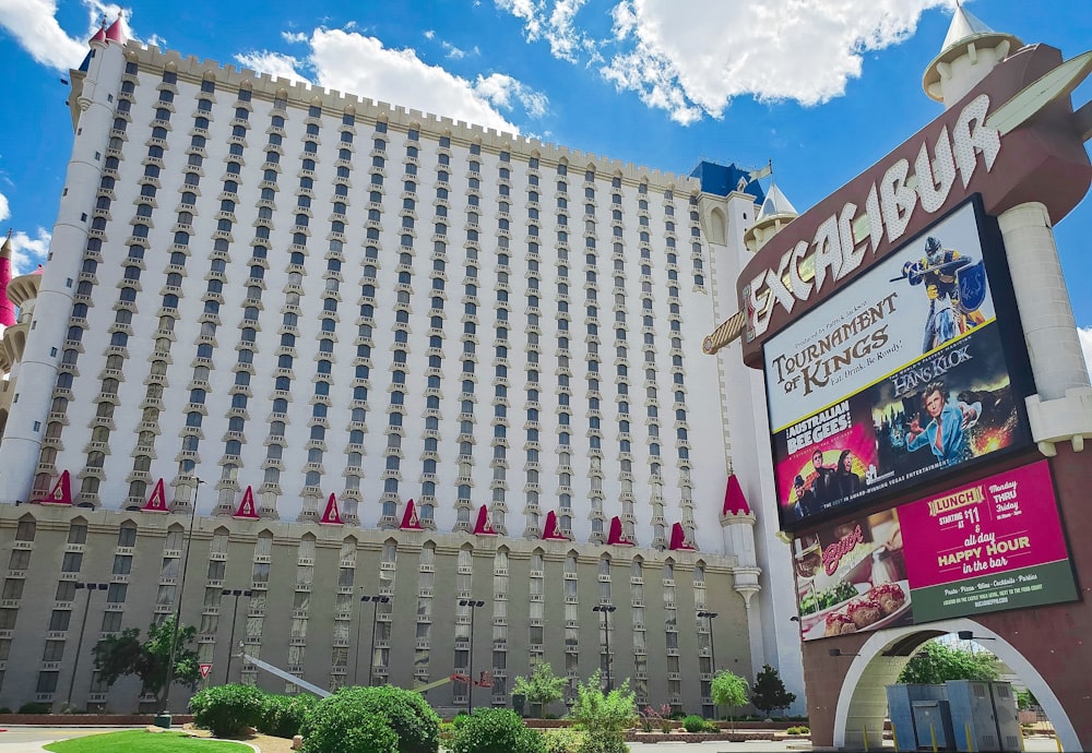 a large building with a sign in front of it