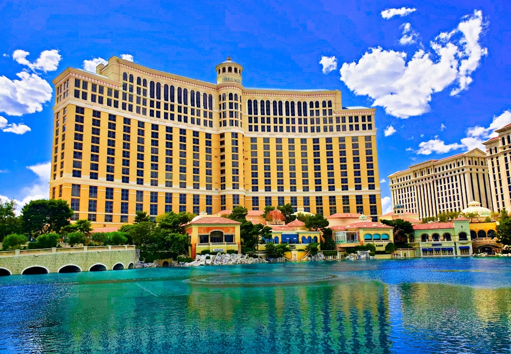 a large building with a fountain in front of it