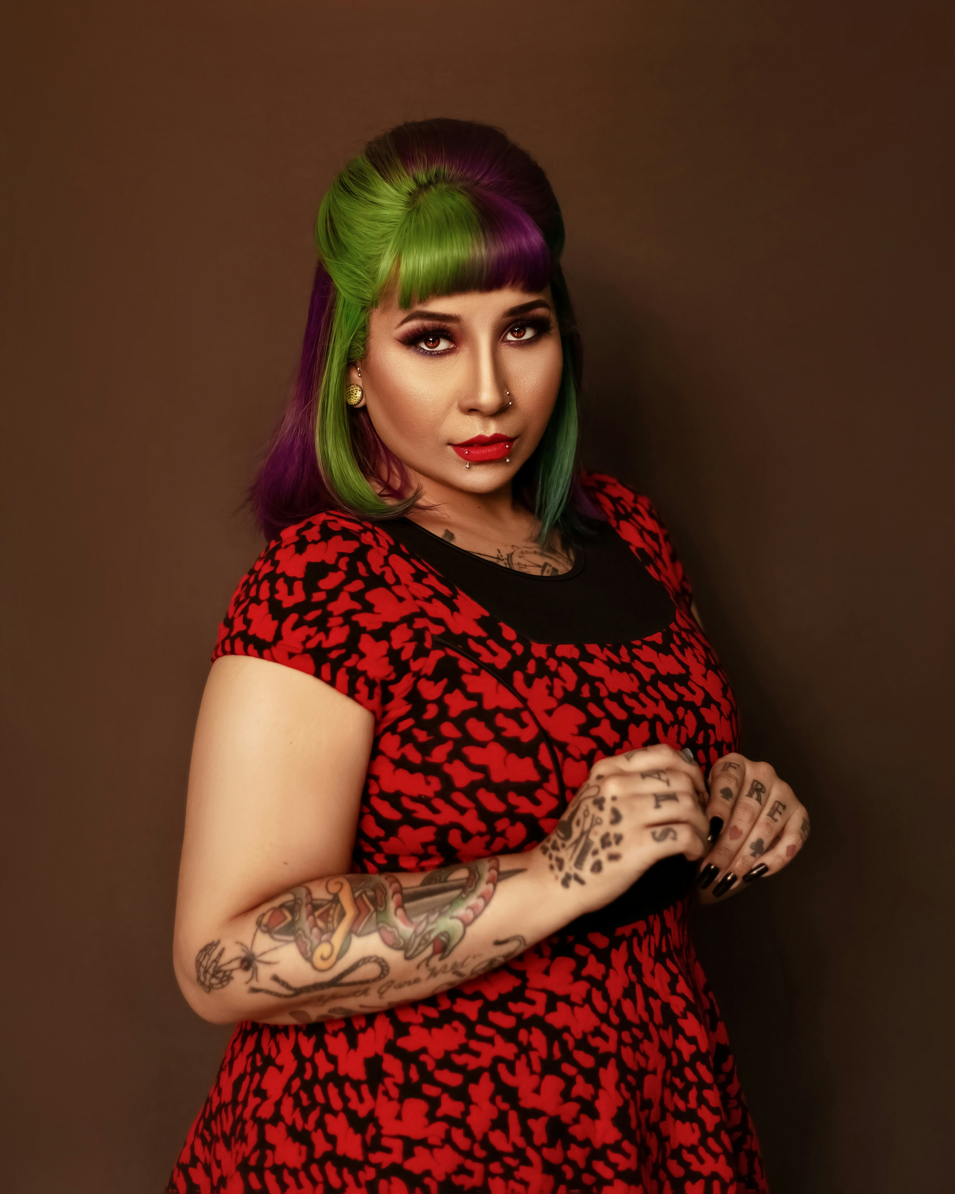 A woman with green hair wearing a red dress photo – Free Green Image on ...