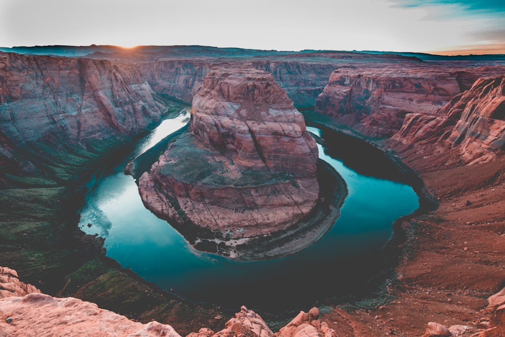 a large canyon with a river running through it