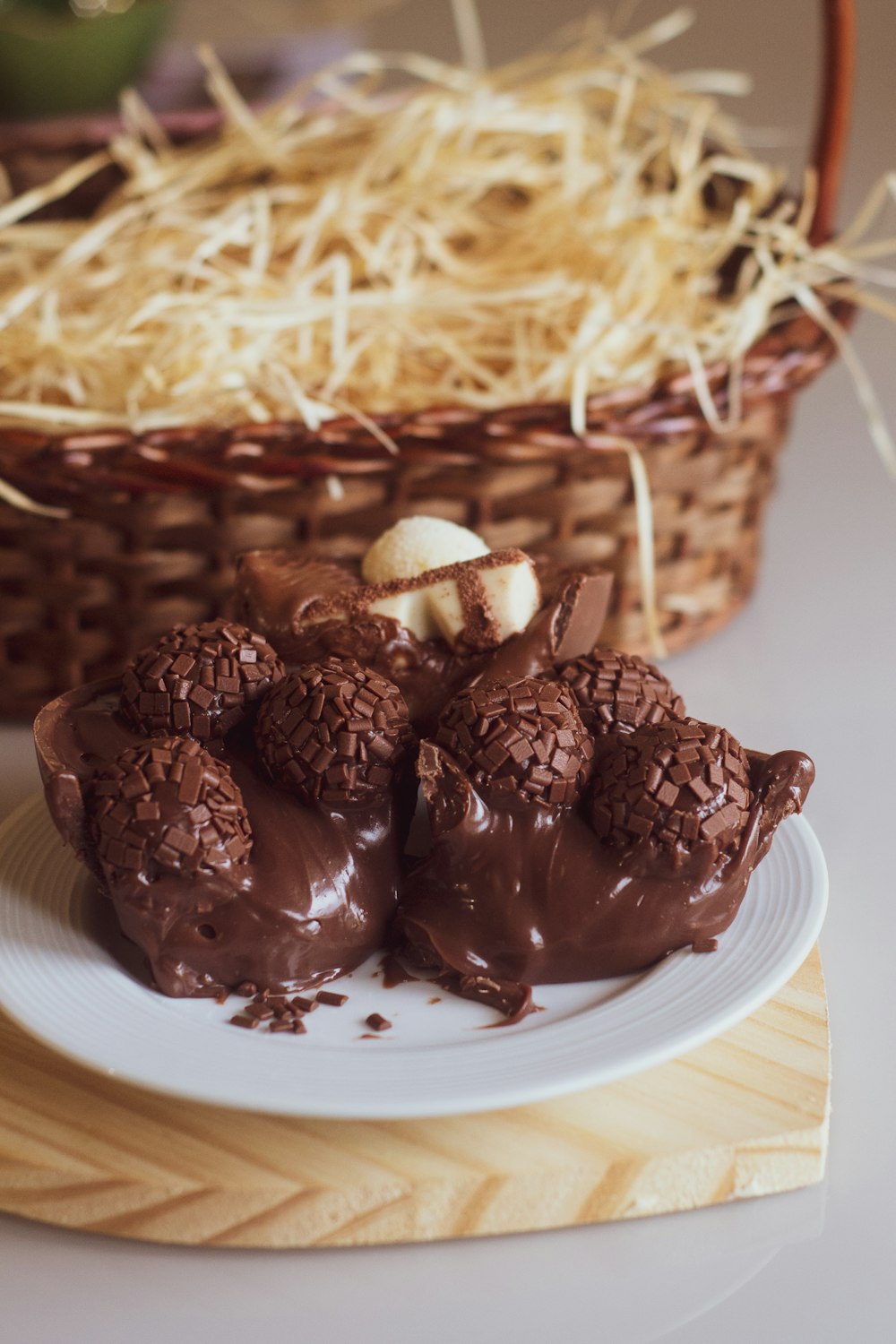 a plate of chocolate truffles on a table