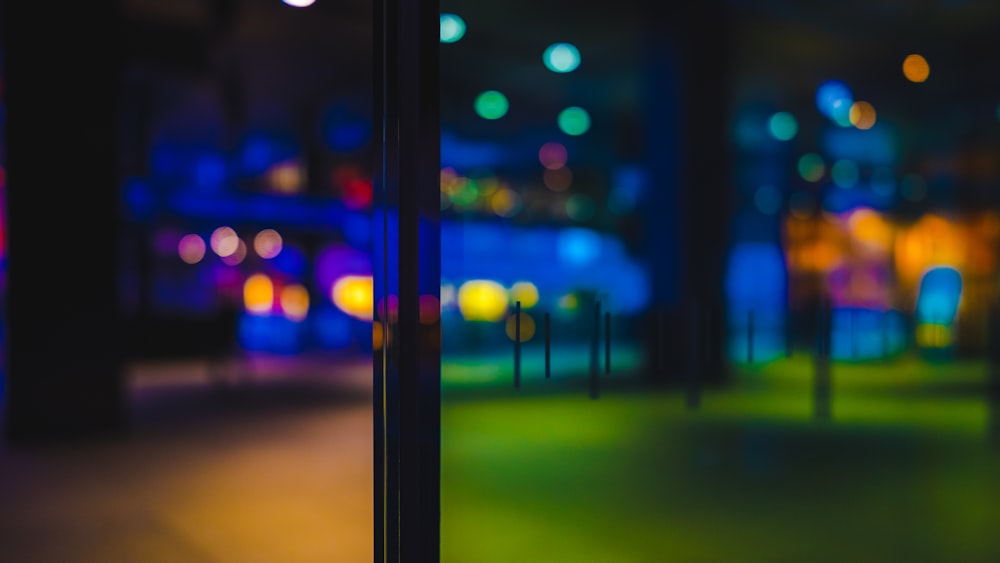 a blurry photo of a city street at night