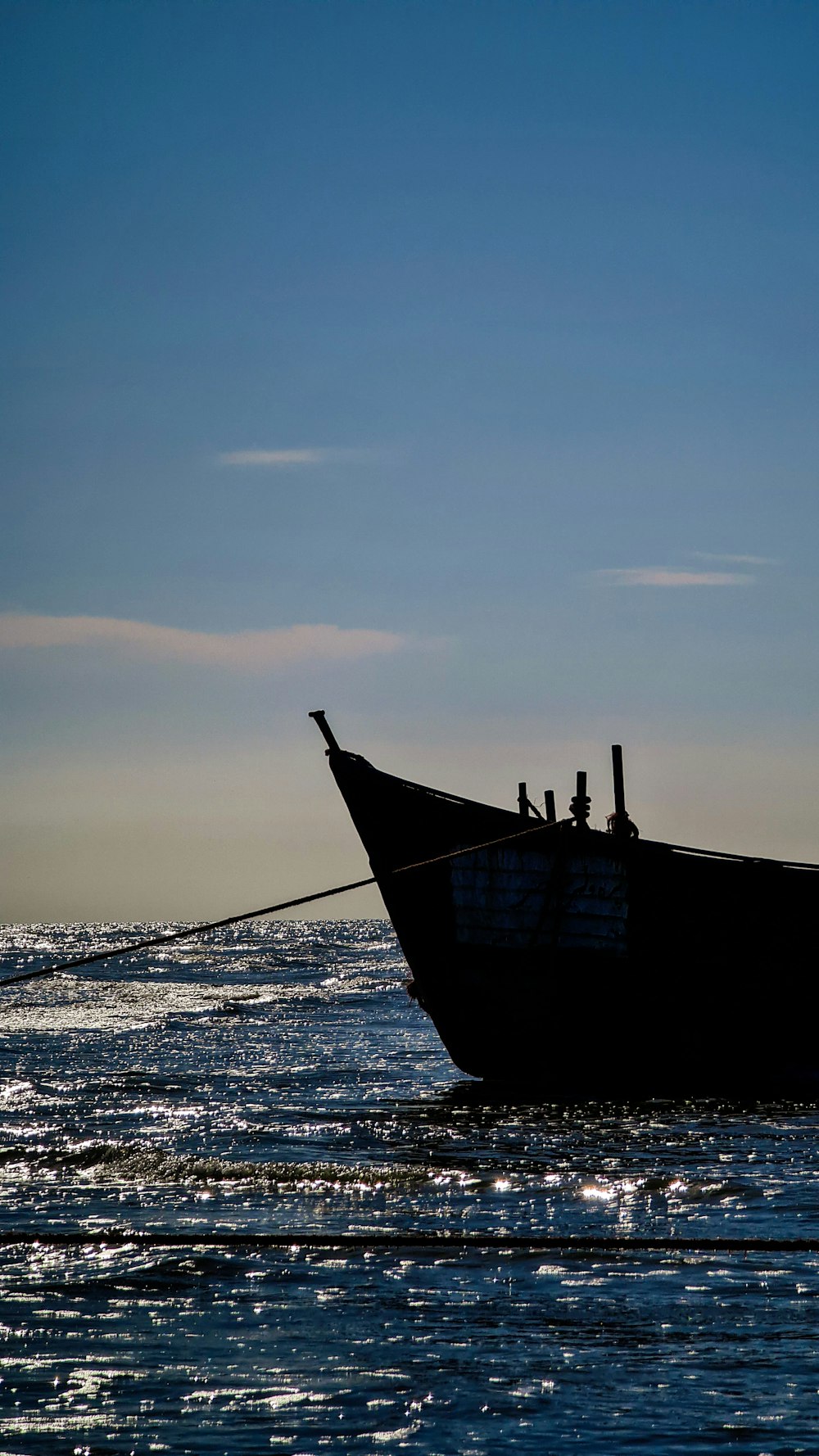 a large boat floating on top of a body of water