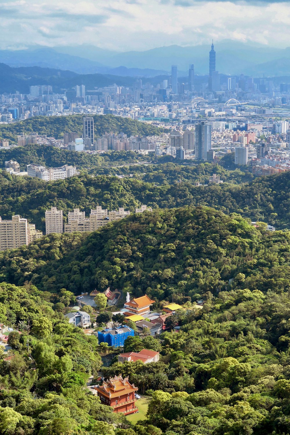 a view of a city from the top of a hill