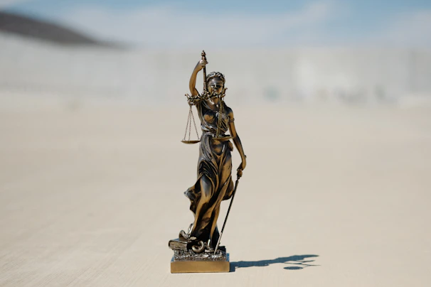 Close-up of a balanced justice scale symbolizing fairness and trust