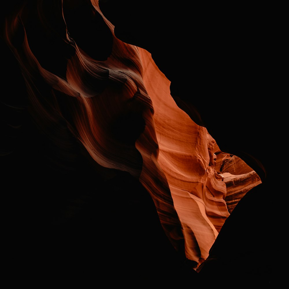 a rock formation in the middle of a black background