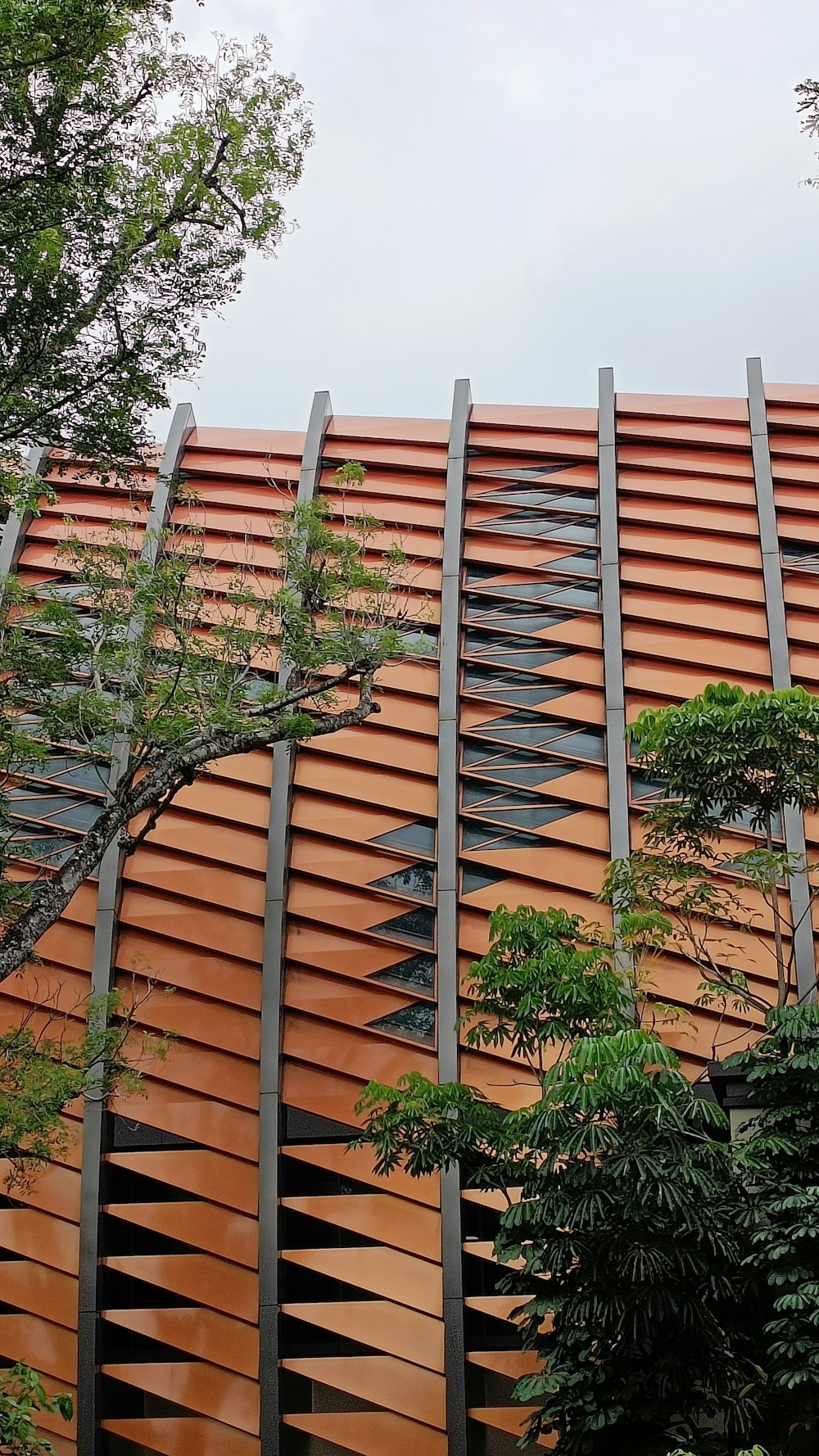 a building that has a lot of wooden slats on it