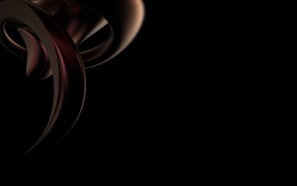 An abstract close-up of metallic textures merging with organic shapes under moody shadows.