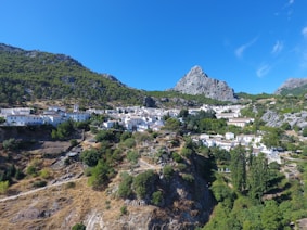 a view of a village on a mountain side