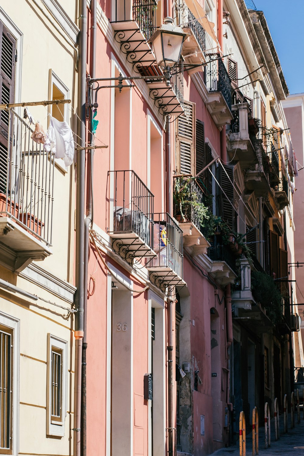 a row of buildings with balconies and balconies on the balcon