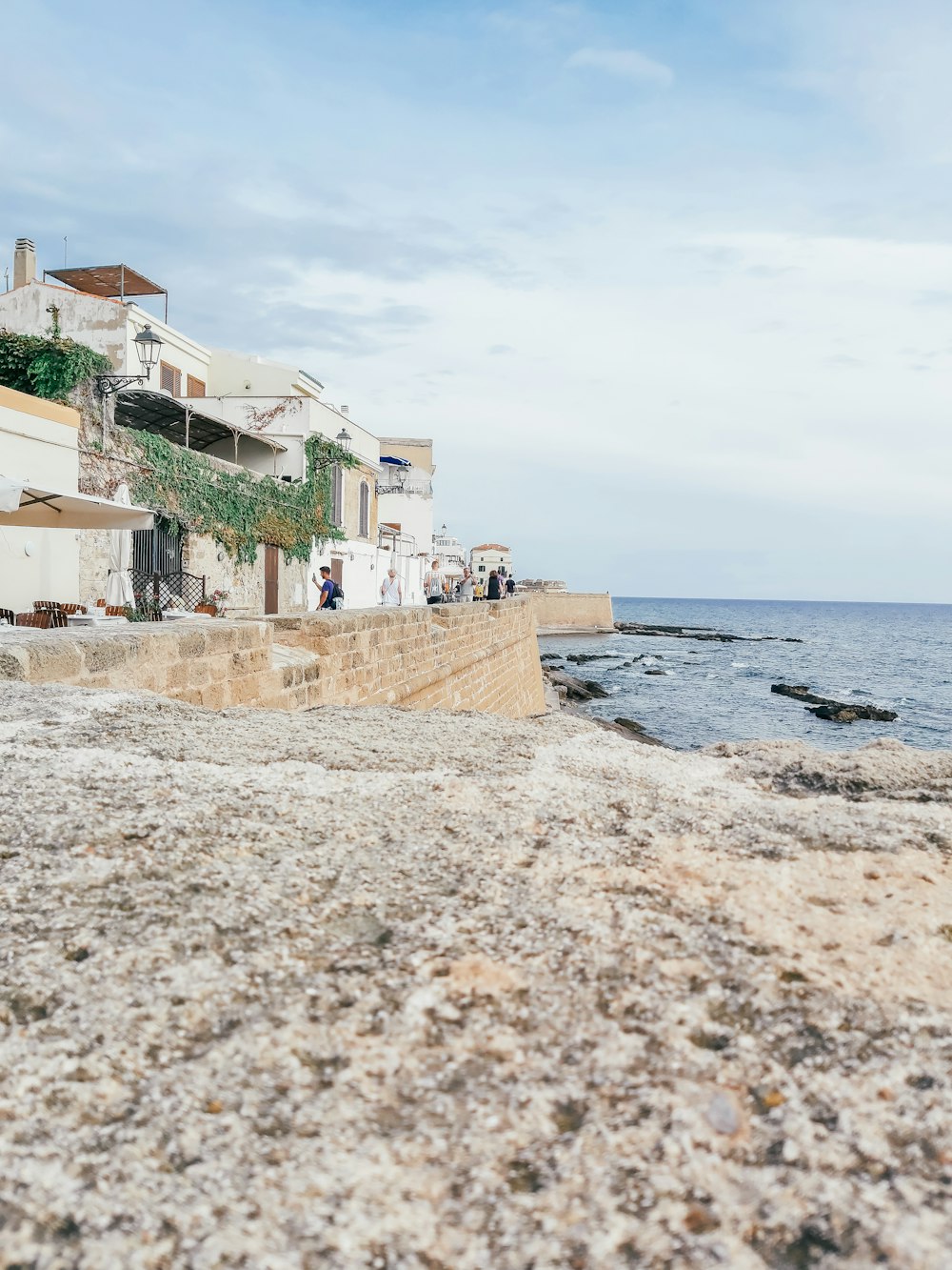 a view of the ocean from the shore of a beach