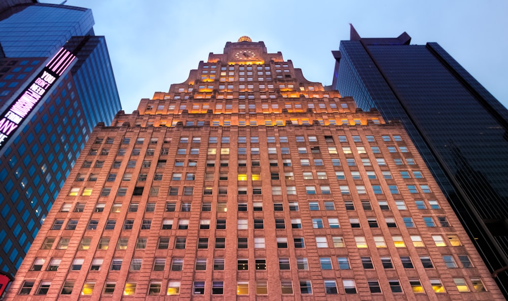 a tall building with a clock on the top of it