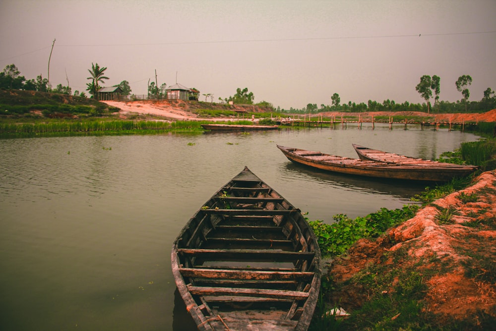 a couple of boats that are sitting in the water