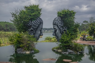 a couple of statues that are in the water
