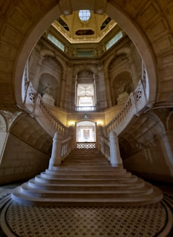 a very large staircase in a very big building