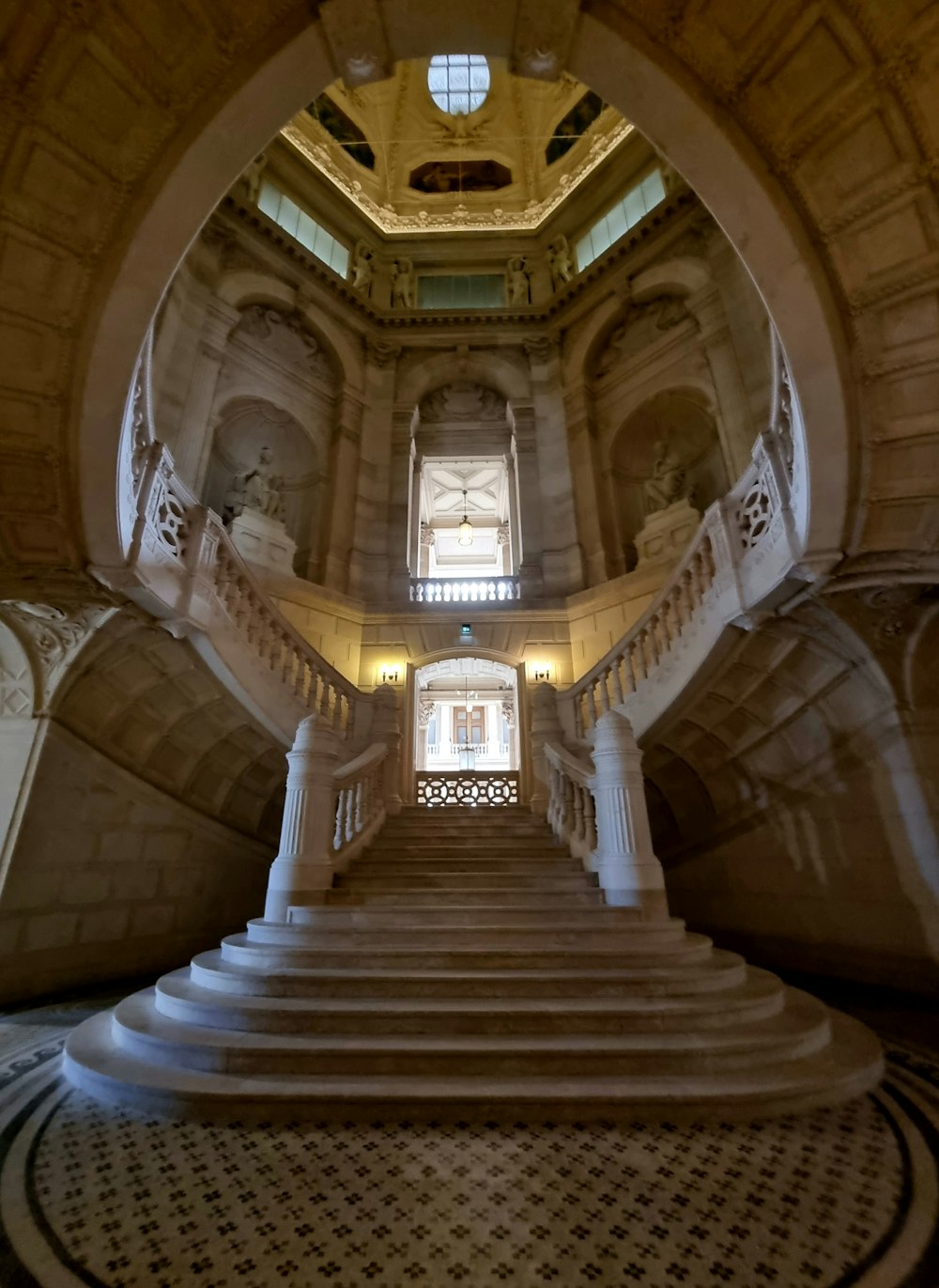 a very large staircase in a very big building