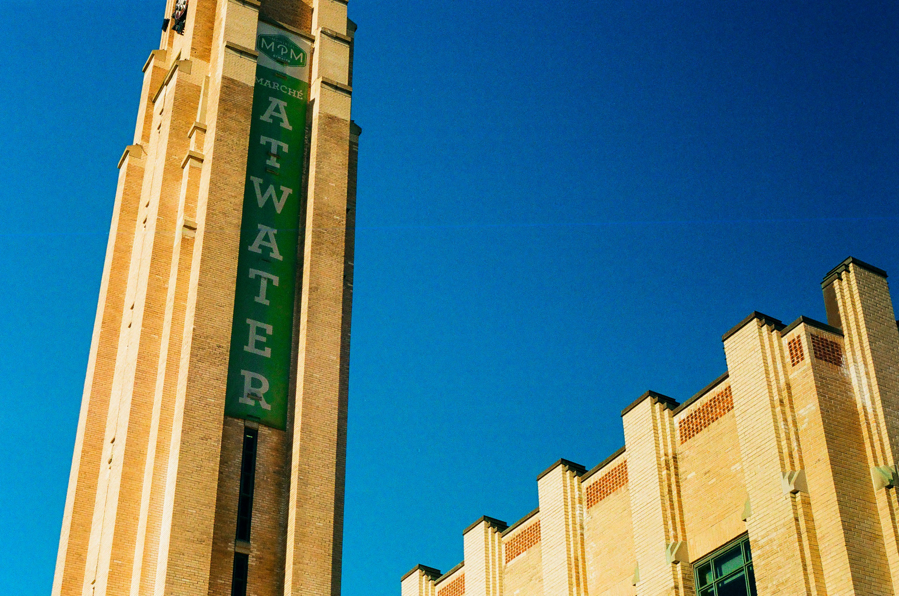 a tall building with a clock on the side of it