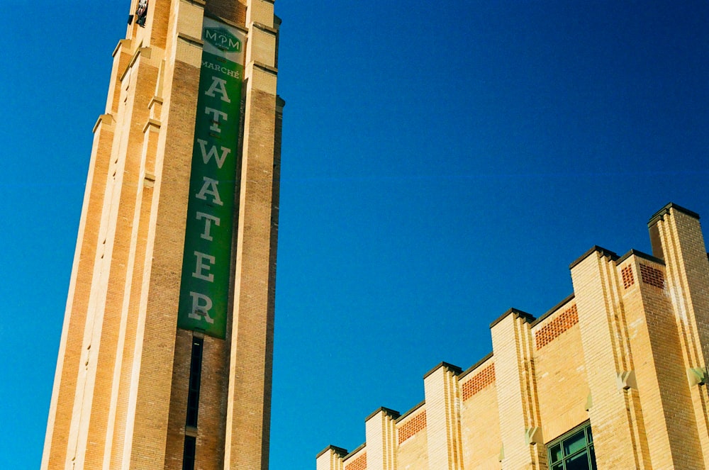 a tall building with a clock on the side of it