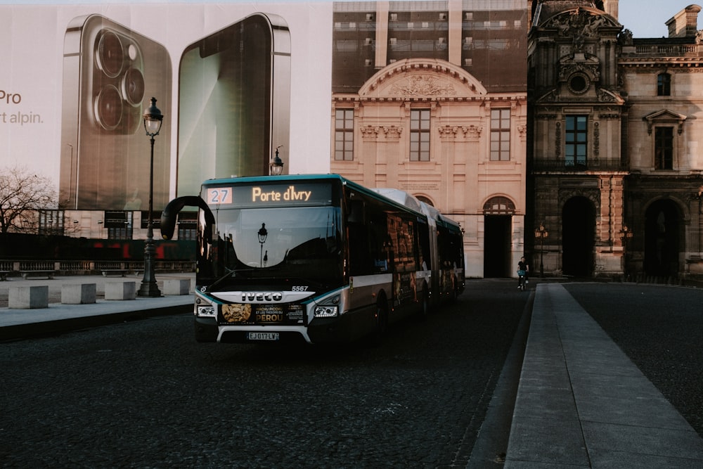 a bus is parked in front of a building