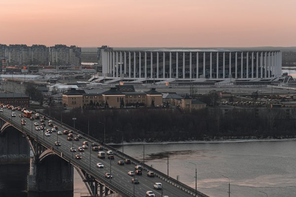 Traffic on a bridge at dusk below the stadium — Nizhny Novgorod, Russia