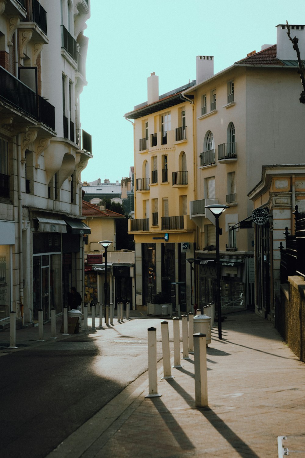 a city street lined with tall buildings