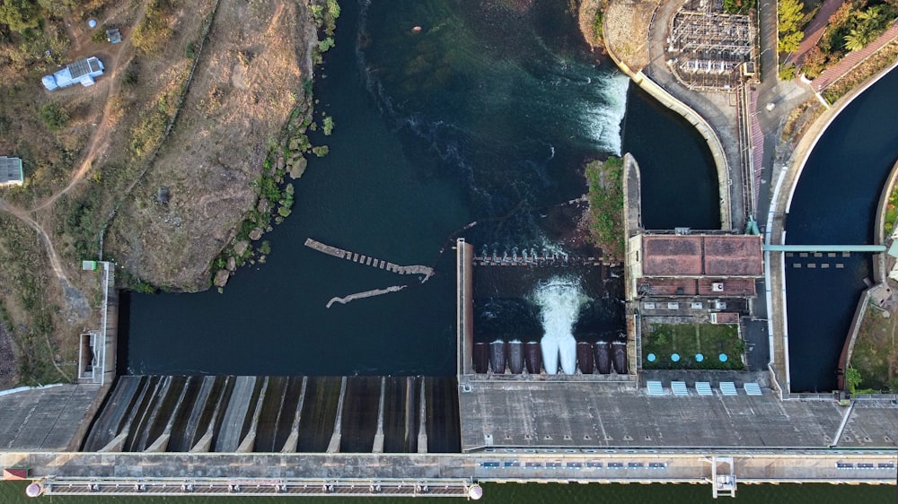 an aerial view of a dam on a river