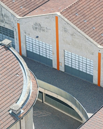 an aerial view of a building with a clock tower