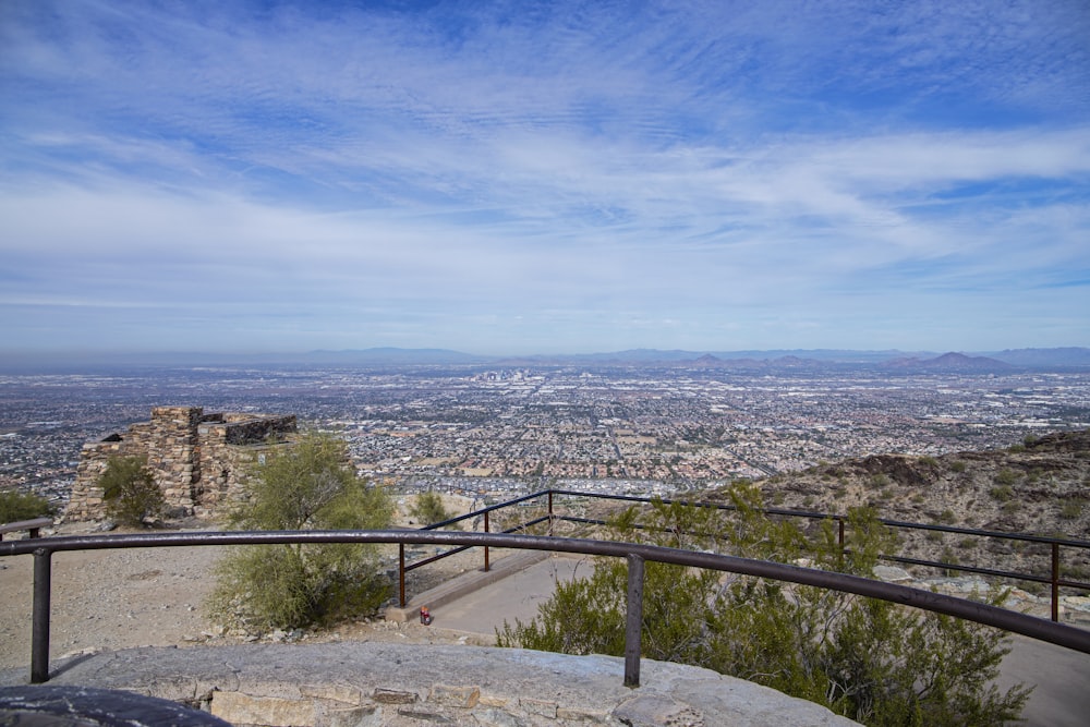 a view of a city from the top of a hill