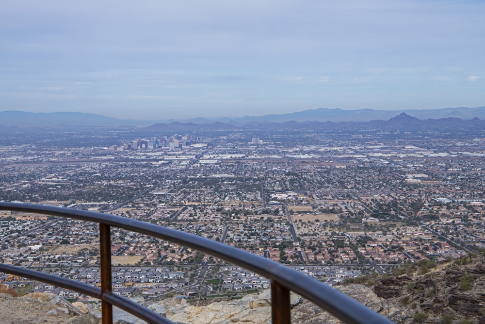 a view of a city from the top of a hill