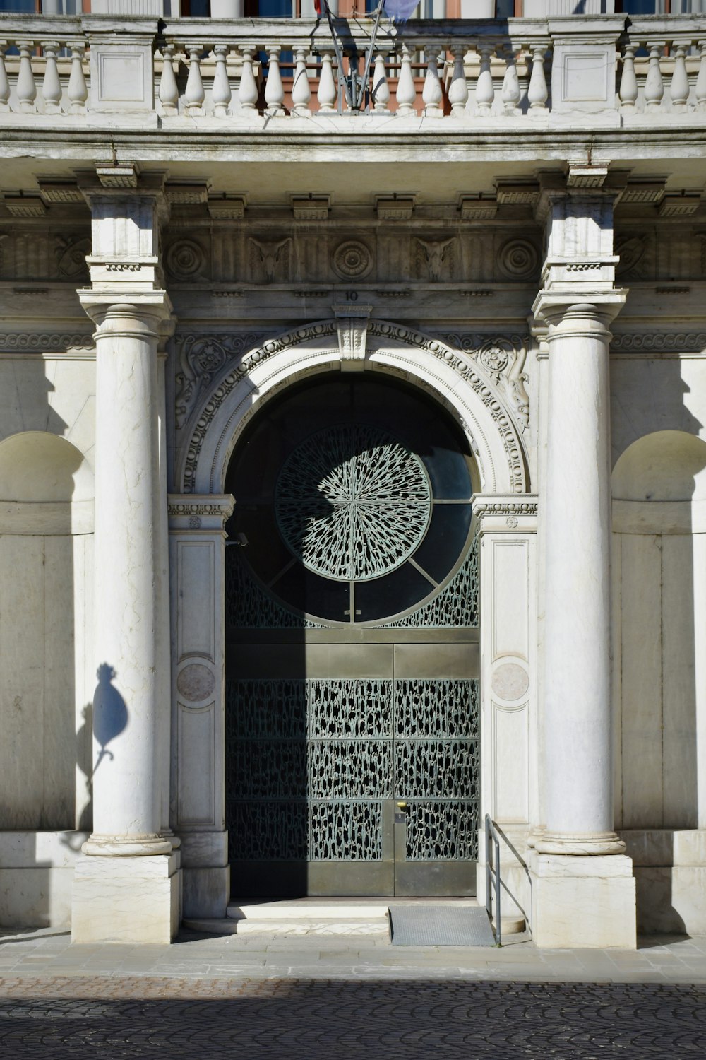 a tall building with a large metal door