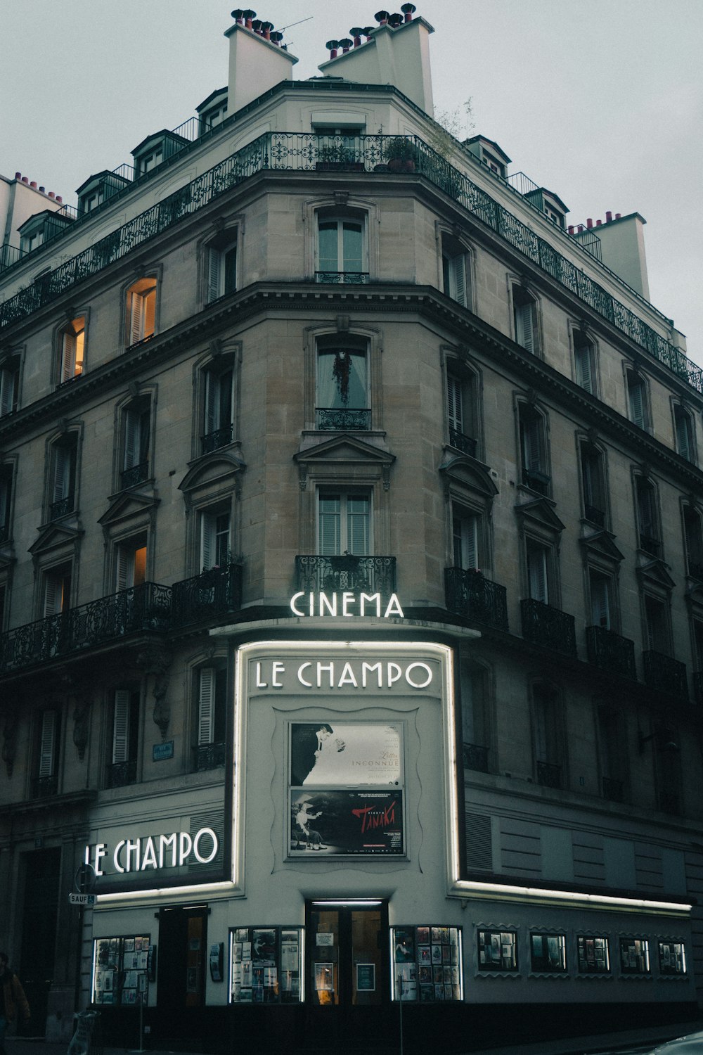 a tall building with a sign on the front of it