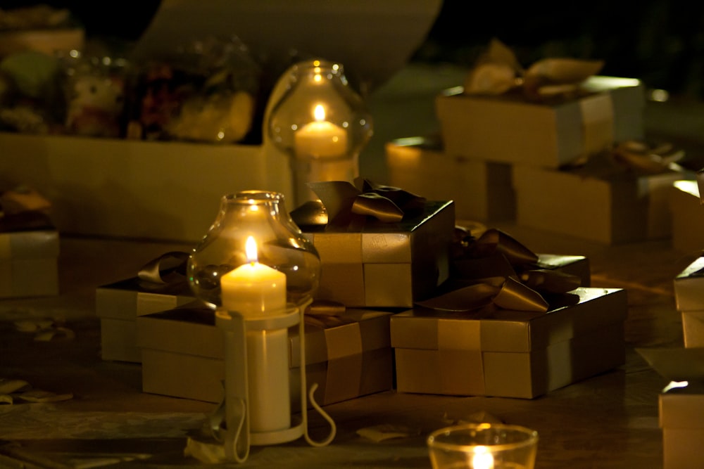 a bunch of candles that are sitting on a table