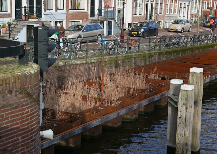 a bike is parked on the side of a bridge