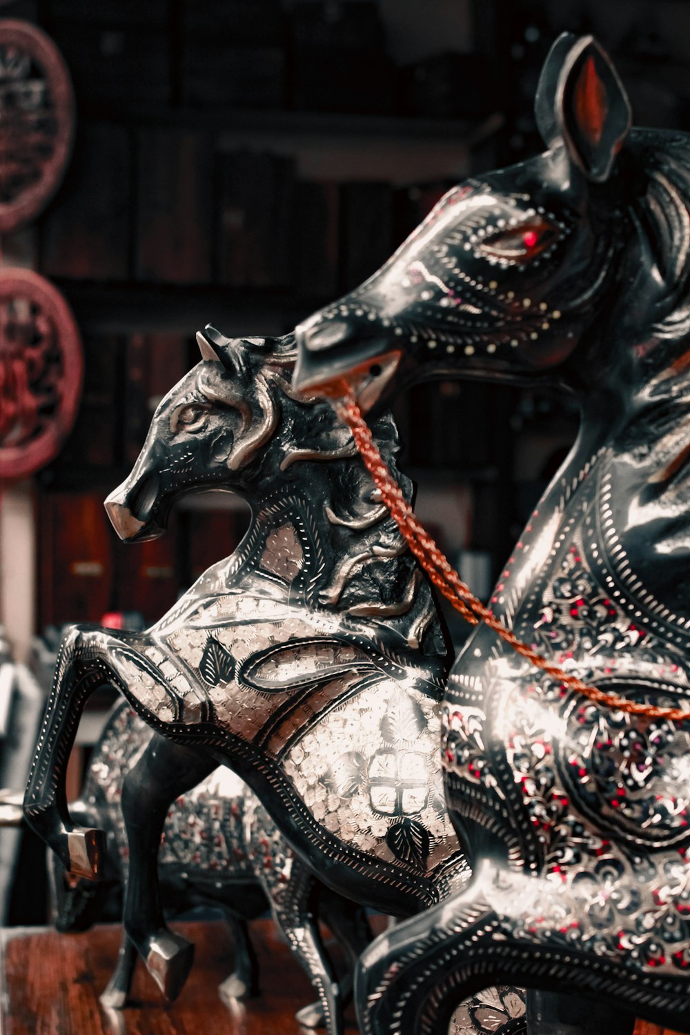 a close up of a horse statue on a table