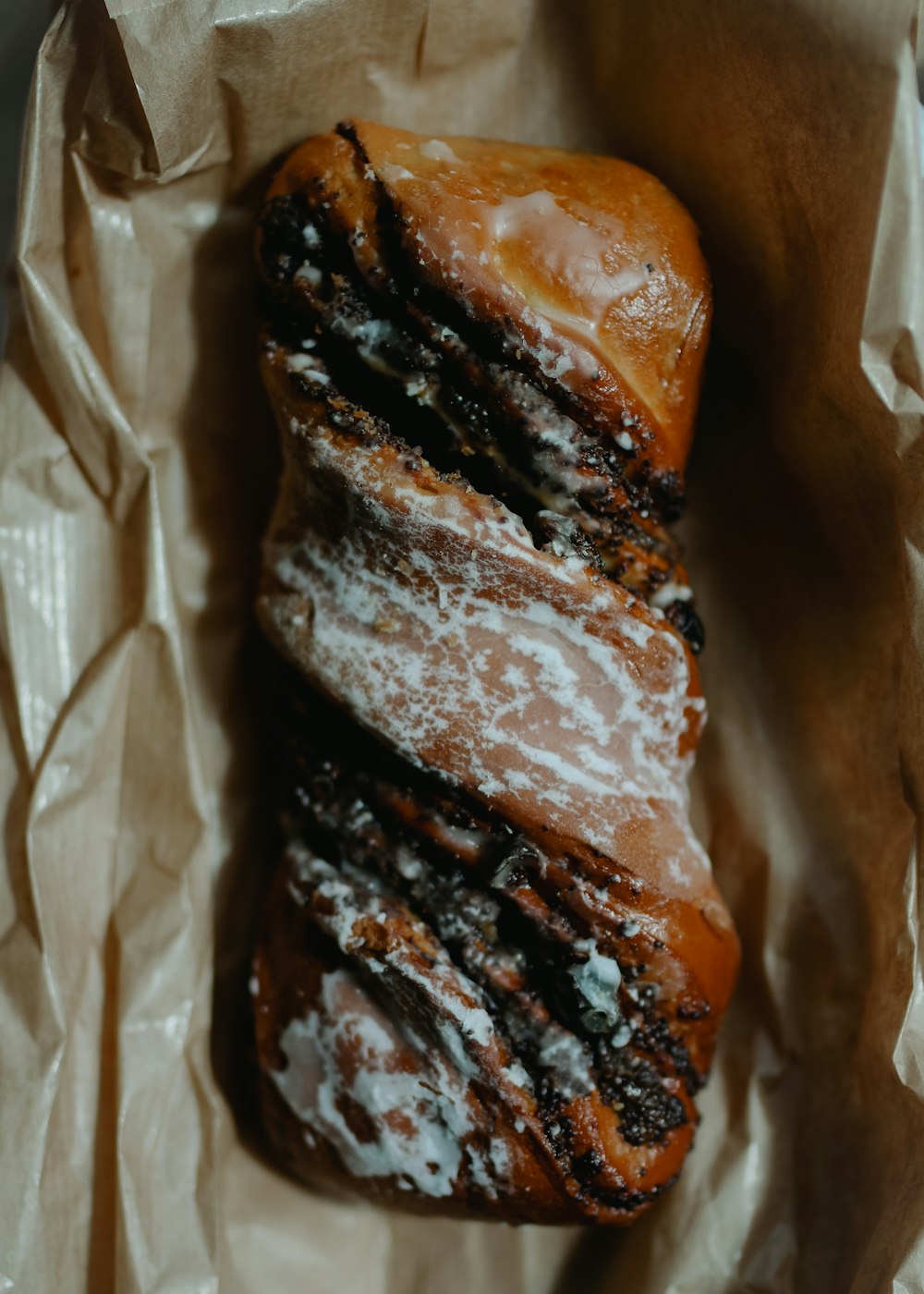 a pastry sitting on top of a piece of wax paper