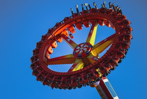 a ferris wheel with a blue sky in the background