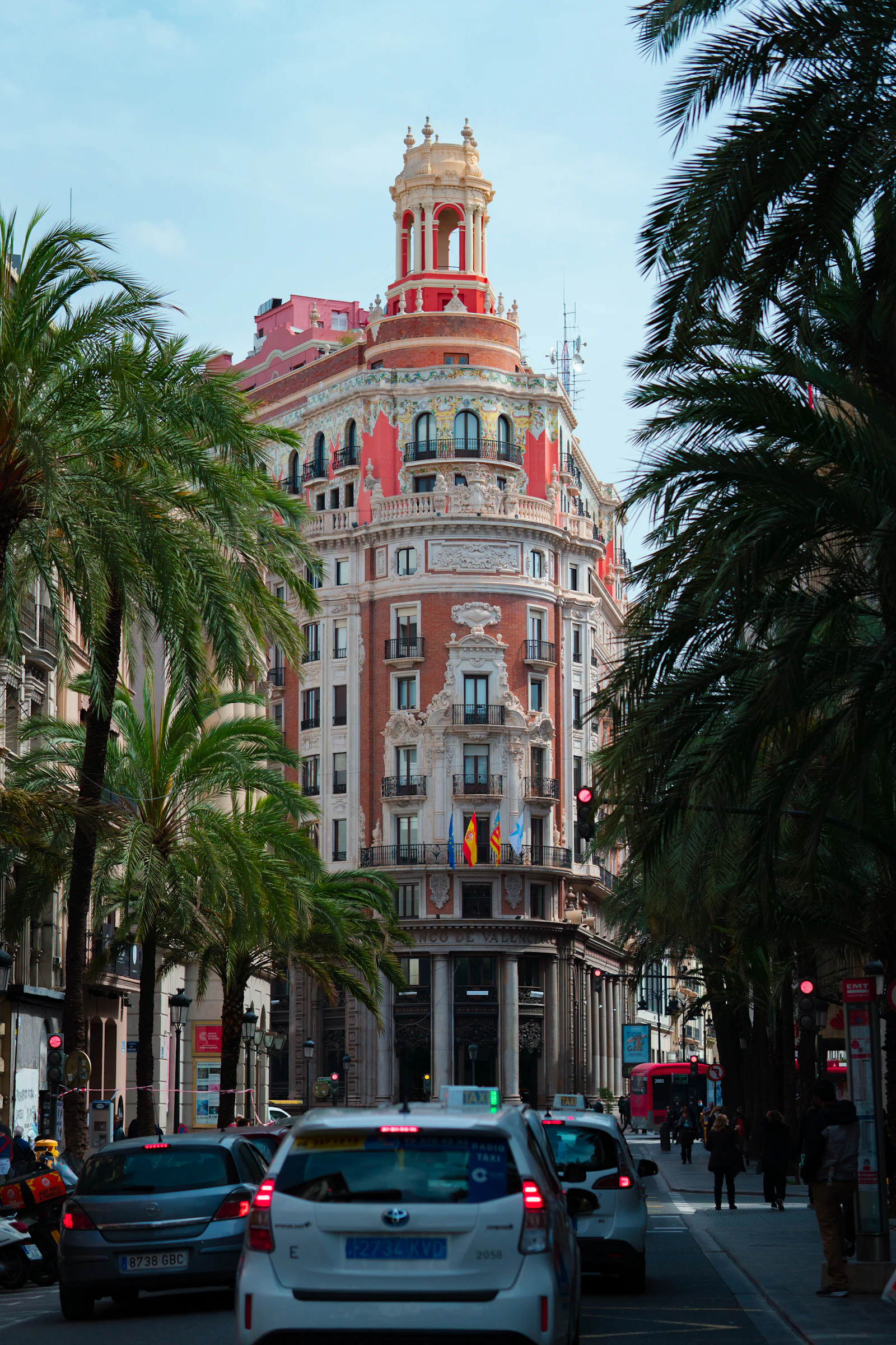 Palm-lined avenue and civic building in Valencia