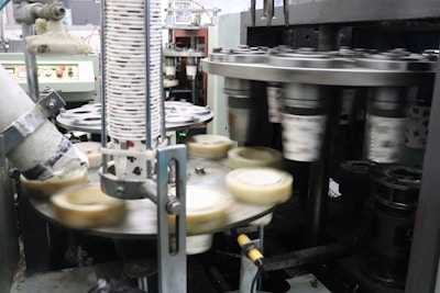 a machine making cheese in a factory