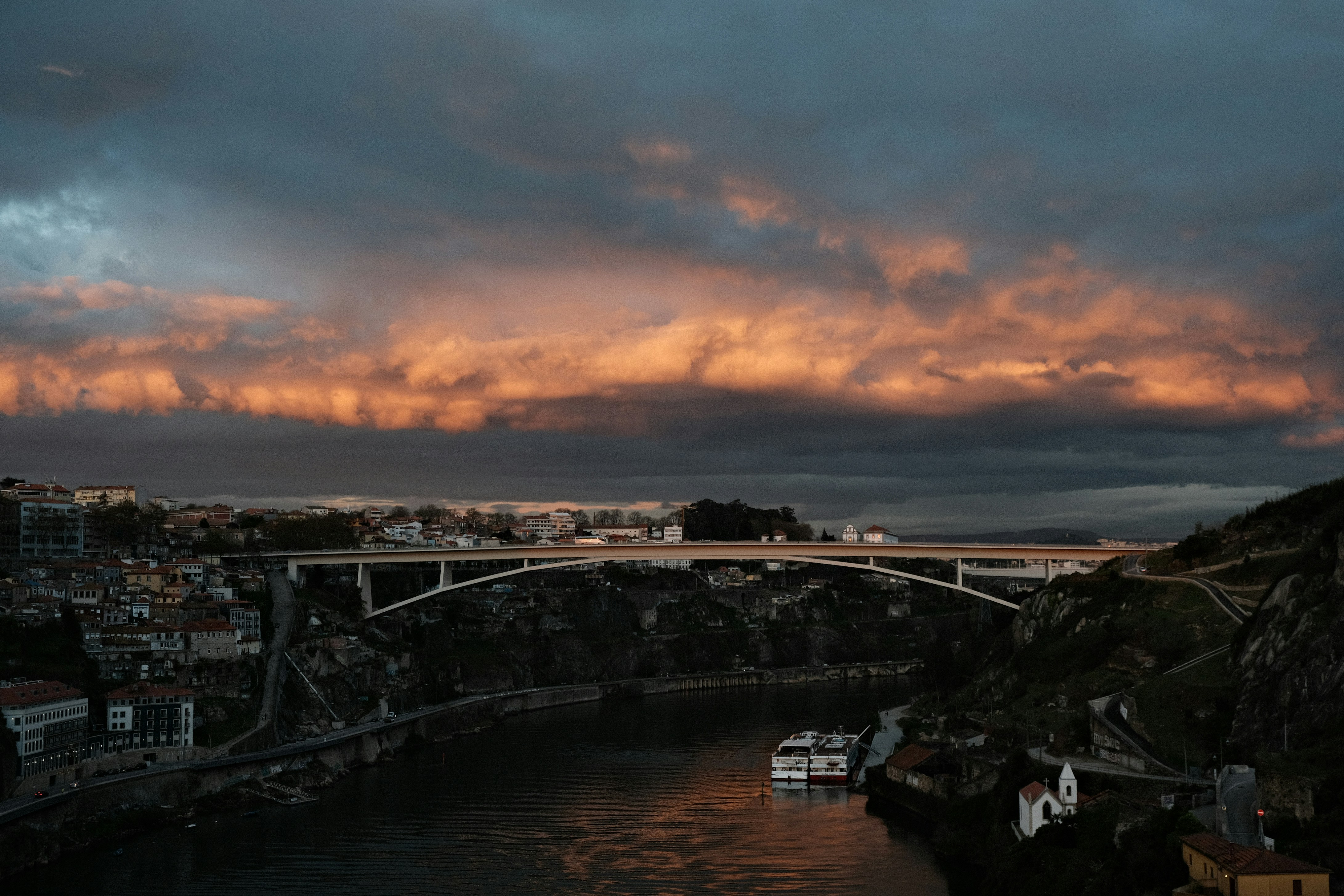 a view of a bridge over a body of water