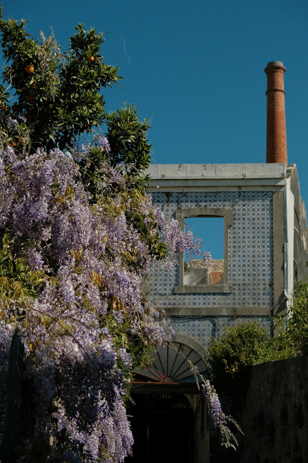 a tall building with a clock on the front of it