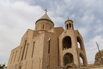 A quiet church building with barred windows symbolizing restriction.