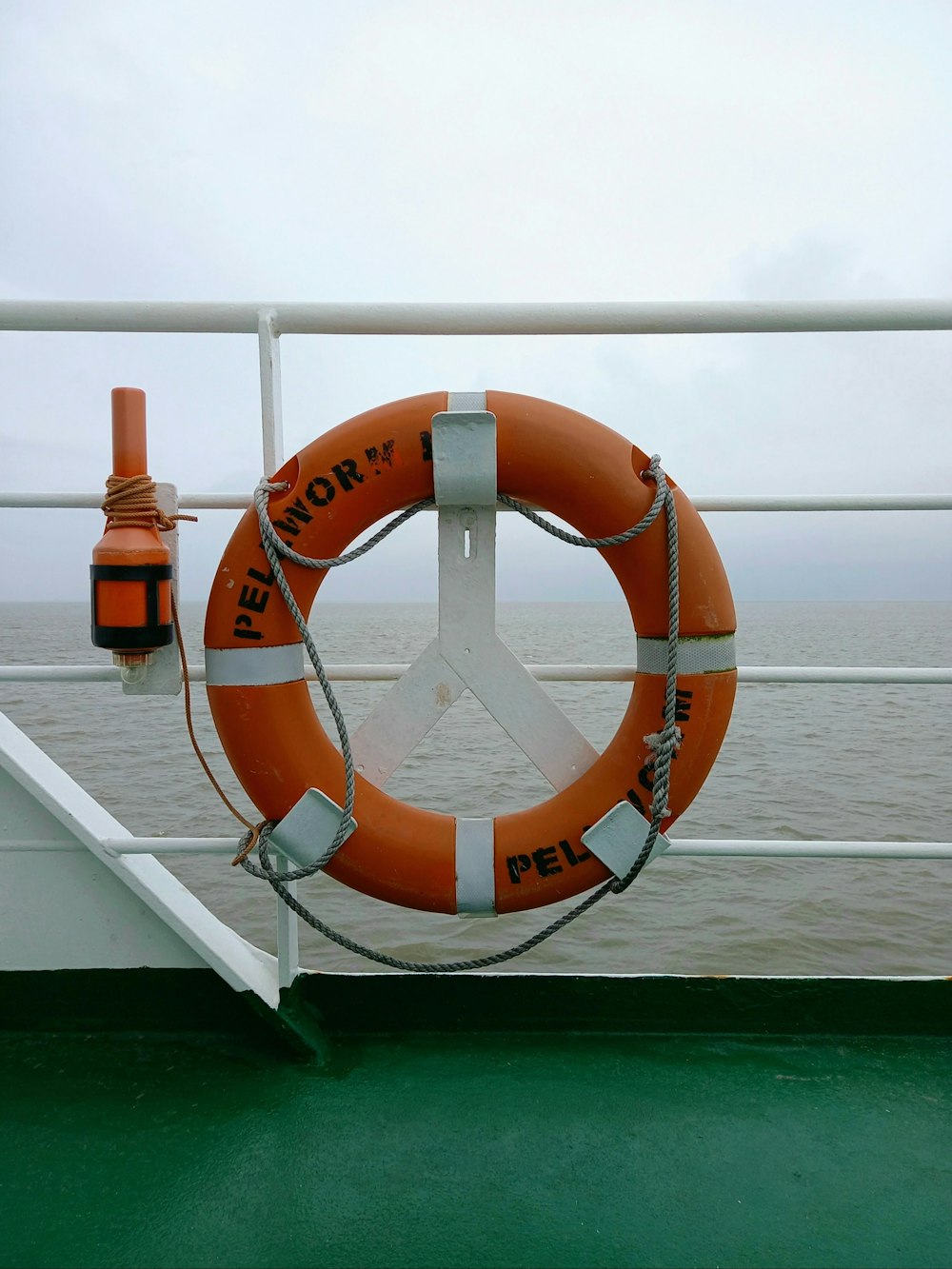 a life preserver on a boat in the ocean