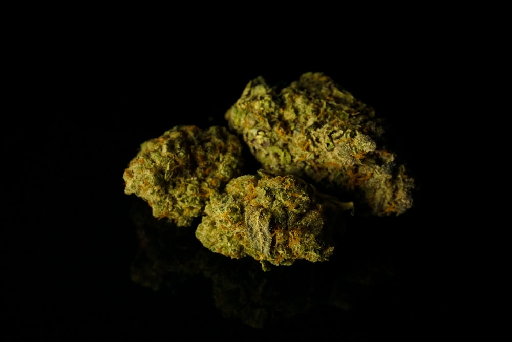 a pile of marijuana sitting on top of a table