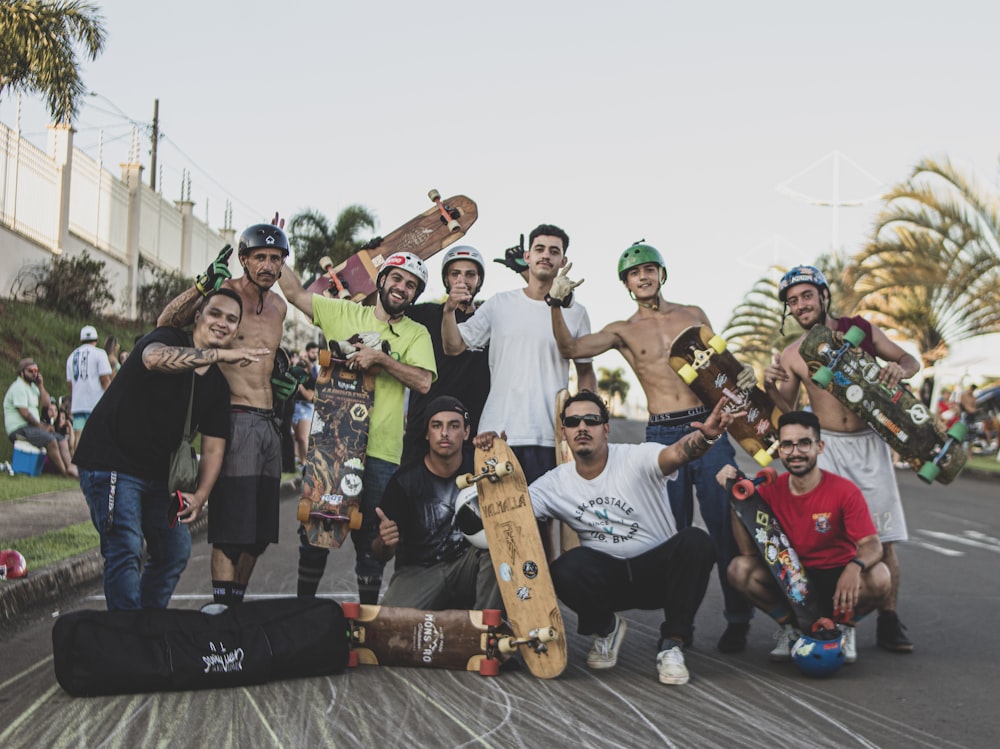 a group of skateboarders posing for a picture