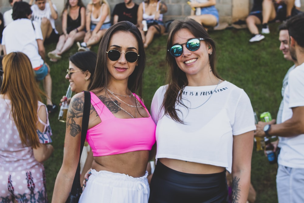 a couple of women standing next to each other