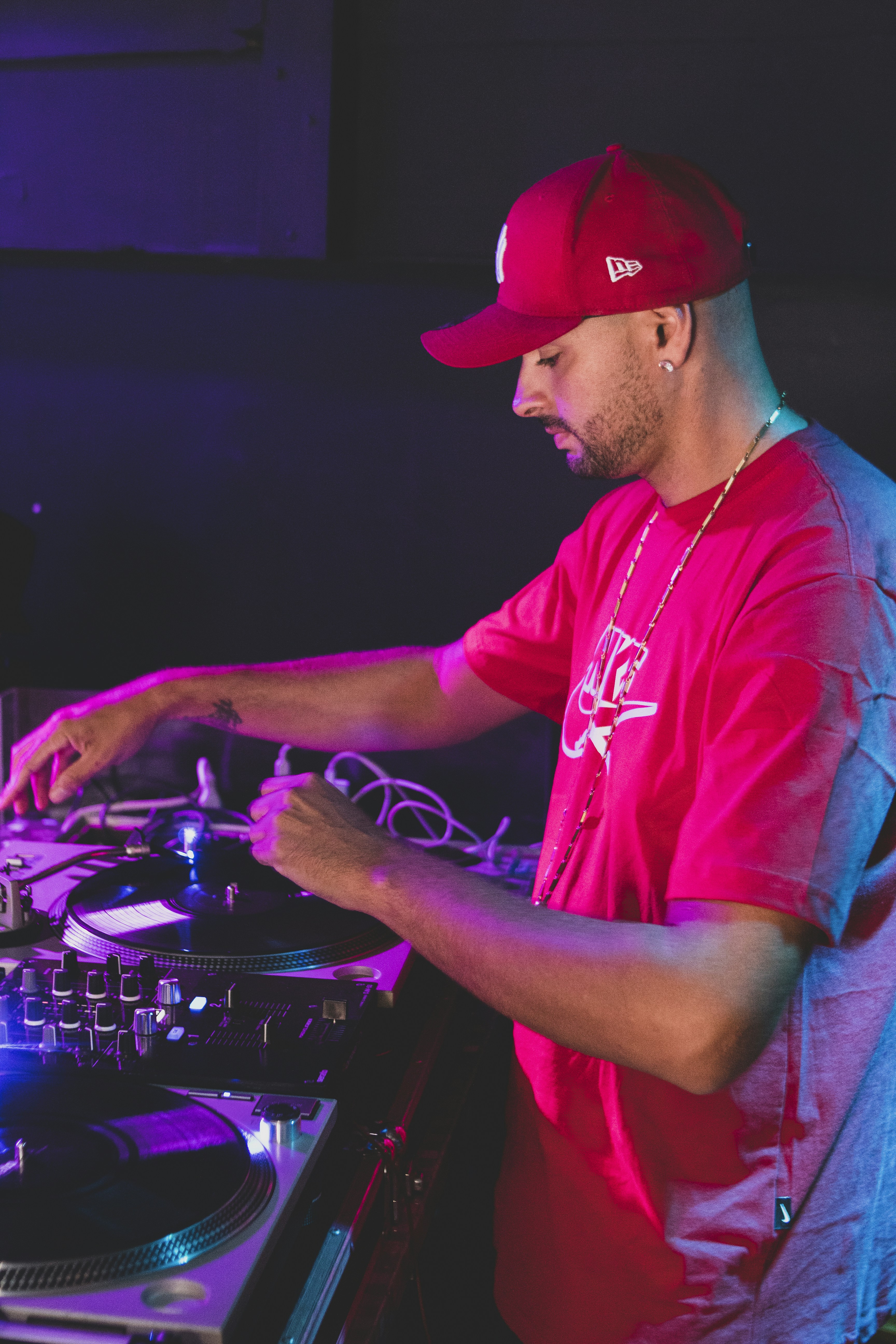 a man in a red shirt and a red hat