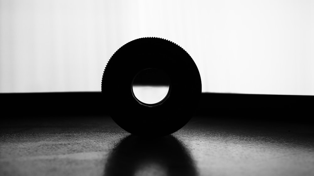 a black and white photo of a camera lens