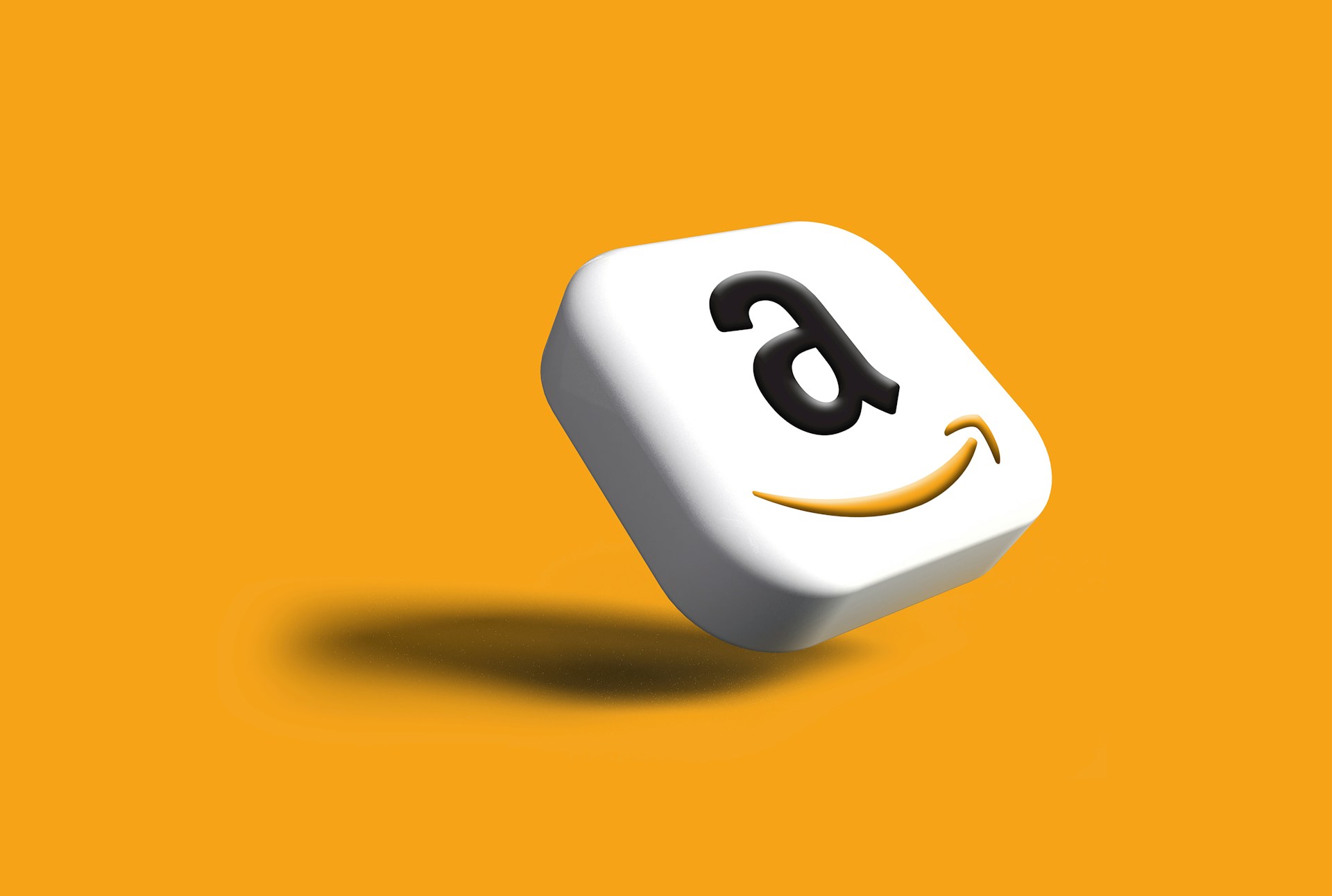 a close up of a dice with an amazon logo on it