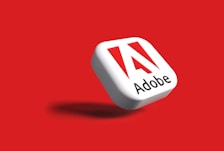 the adobe logo on a red background
