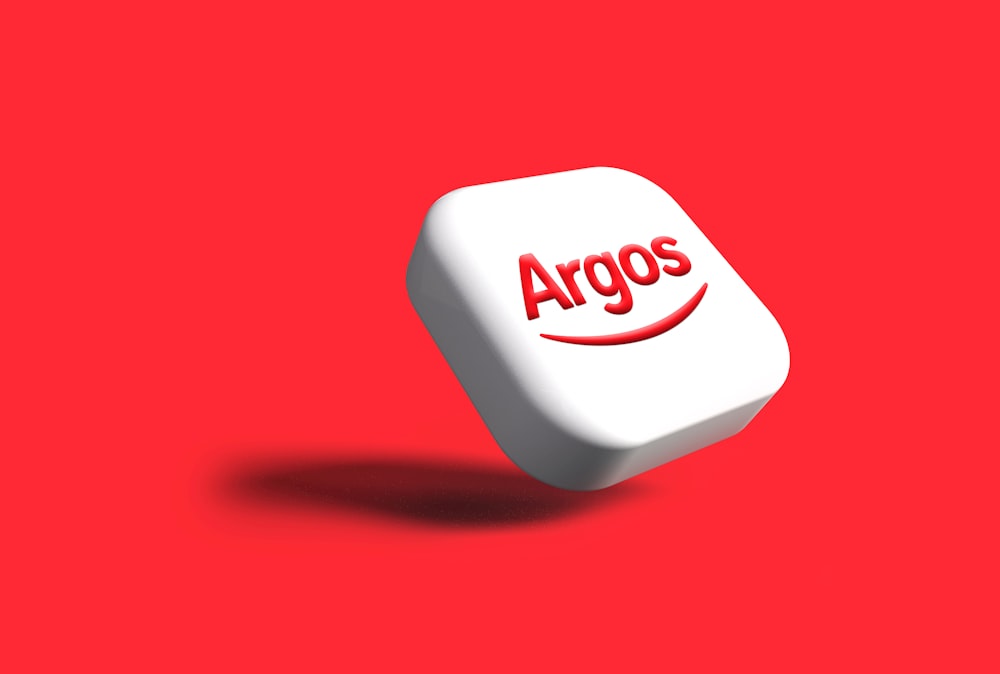 a white cube with the word argos on it